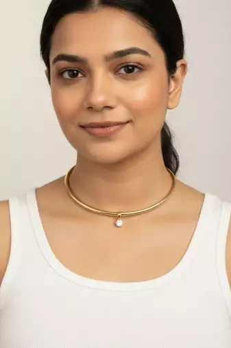 Golden solitaire collar necklace