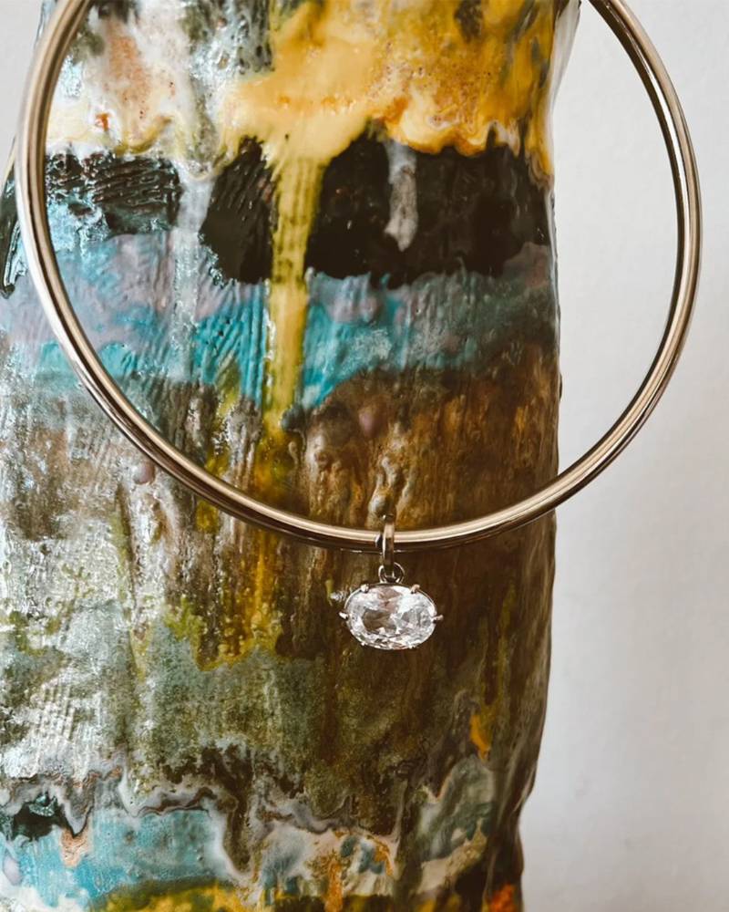 Golden solitaire collar necklace