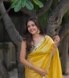 Yellow Embroidery and Real Mirror Work Satin art silk saree 