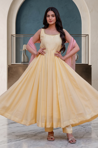 Elegant pastel yellow anarkali dress with soft pink dupatta