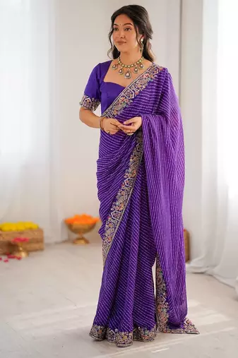 Purple color faux georgette embroidery work wedding wear saree