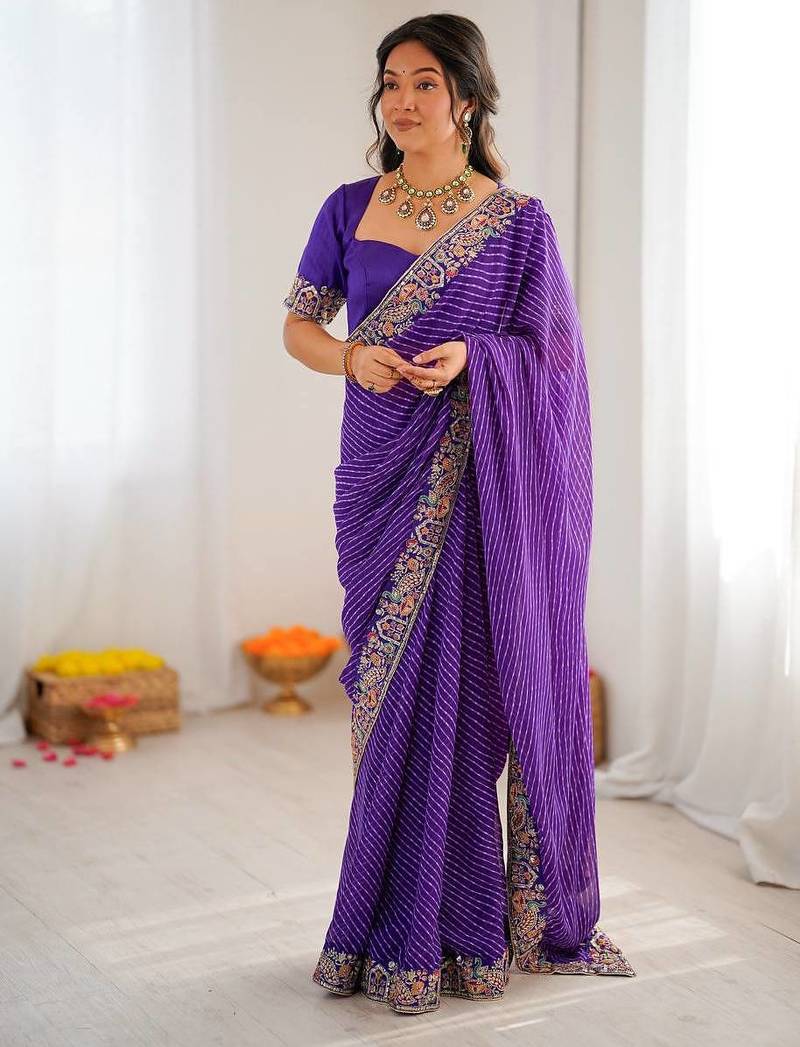 Purple color faux georgette embroidery work wedding wear saree