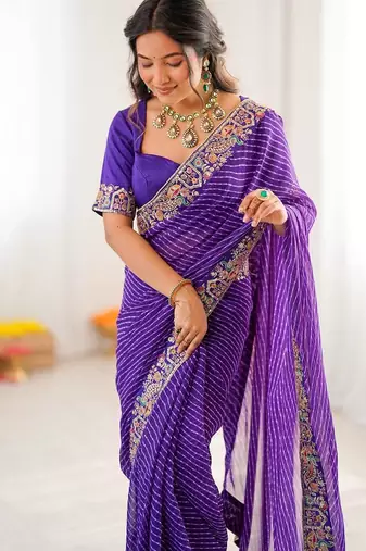 Purple color faux georgette embroidery work wedding wear saree