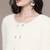 White nylon sweater