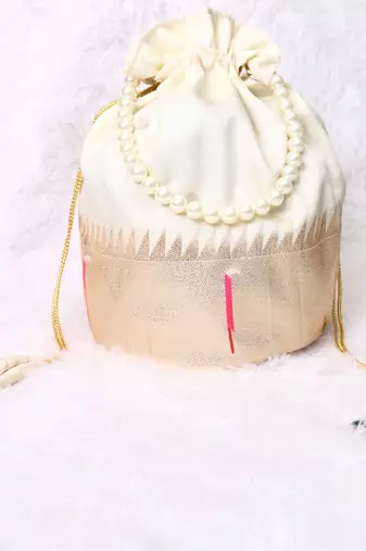 Cream color pearl handle designer batwa