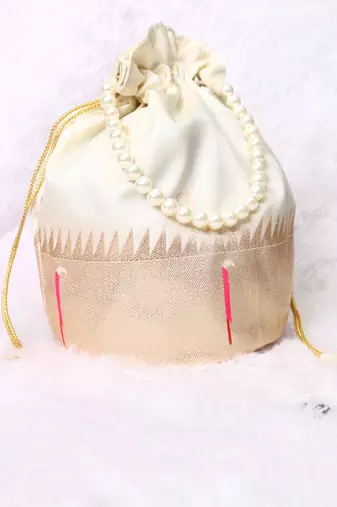 Cream color pearl handle designer batwa