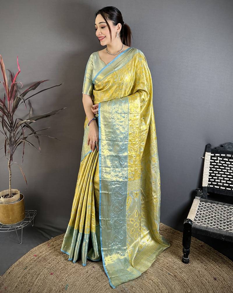 Yellow, blue floral, paisely, zari woven kanjivaram semi silk saree with blouse