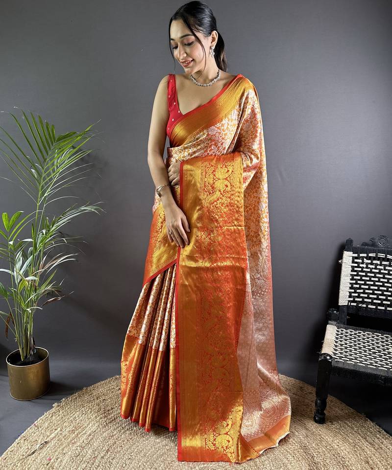 Orange floral, peacock zari woven kanjivaram tissue silk saree with blouse