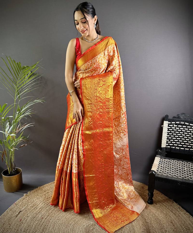 Orange floral, peacock zari woven kanjivaram tissue silk saree with blouse