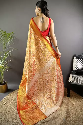 Orange floral, peacock zari woven kanjivaram tissue silk saree with blouse