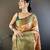 Peach, green floral, zari woven kanjivaram tissue silk saree with blouse