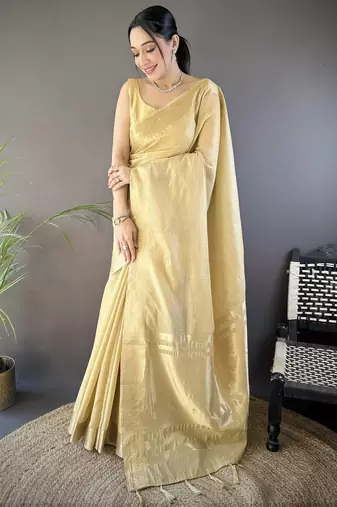 Beige striped, zari woven cotton saree with blouse