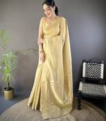 Beige striped, zari woven cotton saree with blouse