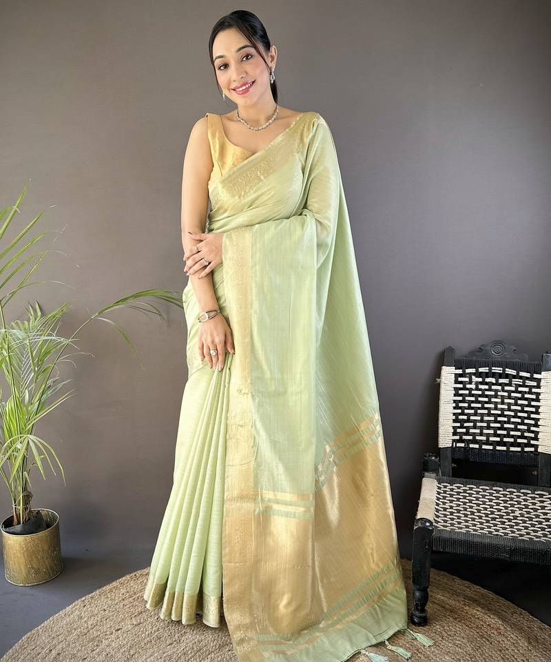 Light green striped, zari woven cotton saree with blouse