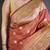 Rust orange floral, zari woven banarasi silk saree with blouse