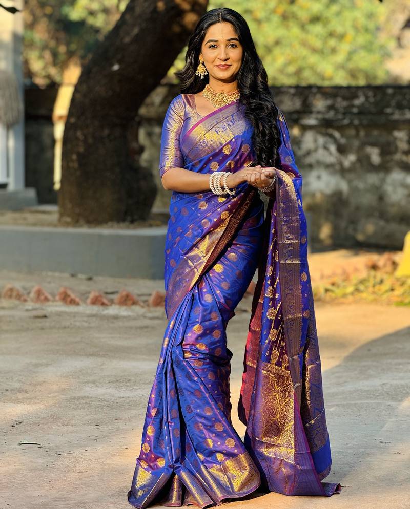 Blue floral, zari woven banarasi silk saree with blouse