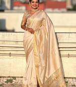 Cream striped, solid,  zari woven tussar silk saree with blouse