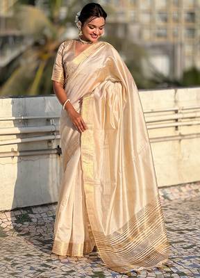 Cream striped solid zari woven tussar silk blend saree with blouse 4