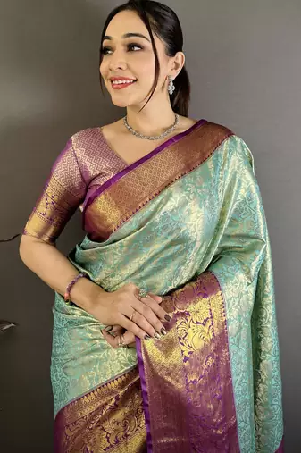 Aqua blue purple floral zari woven silk blend saree with blouse