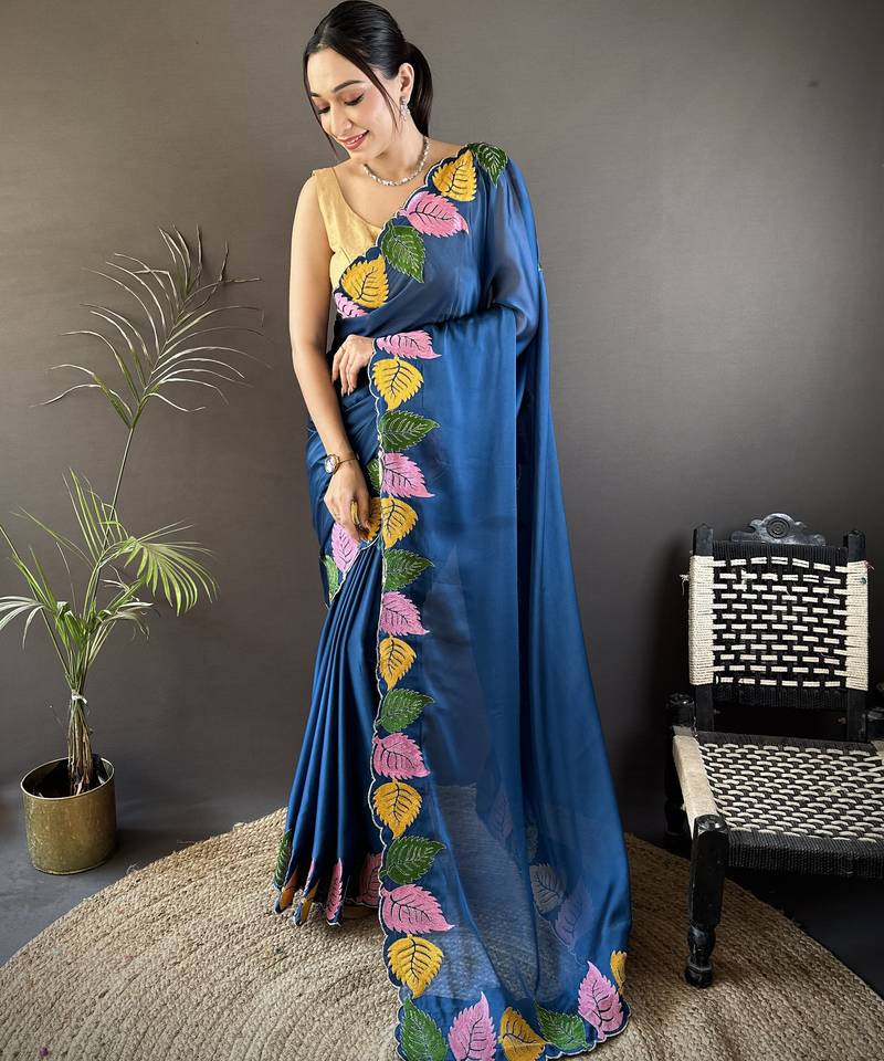 Blue floral emboidery, solid rangoli silk saree with blouse