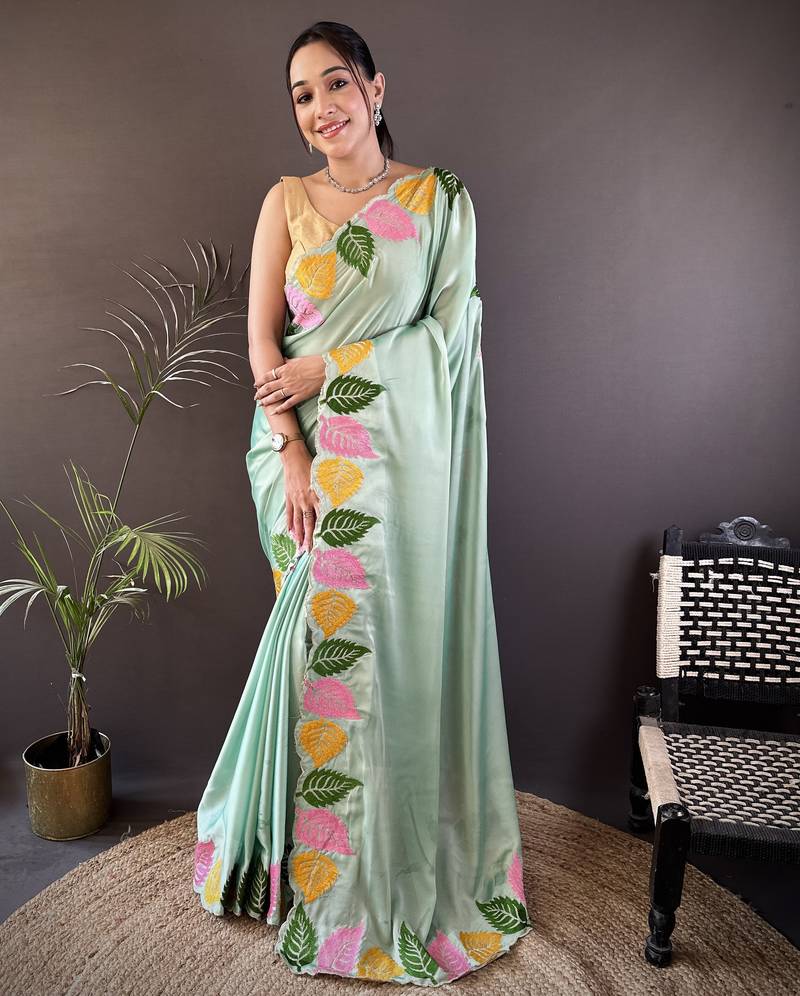Pista green floral emboidery, solid rangoli silk saree with blouse