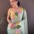 Pista green floral emboidery, solid rangoli silk saree with blouse