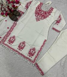 White kurta set with red embroidery