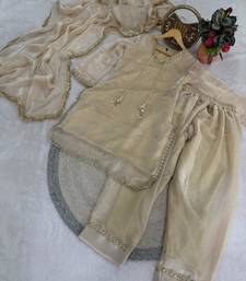Beige designer farshi salwar suit.