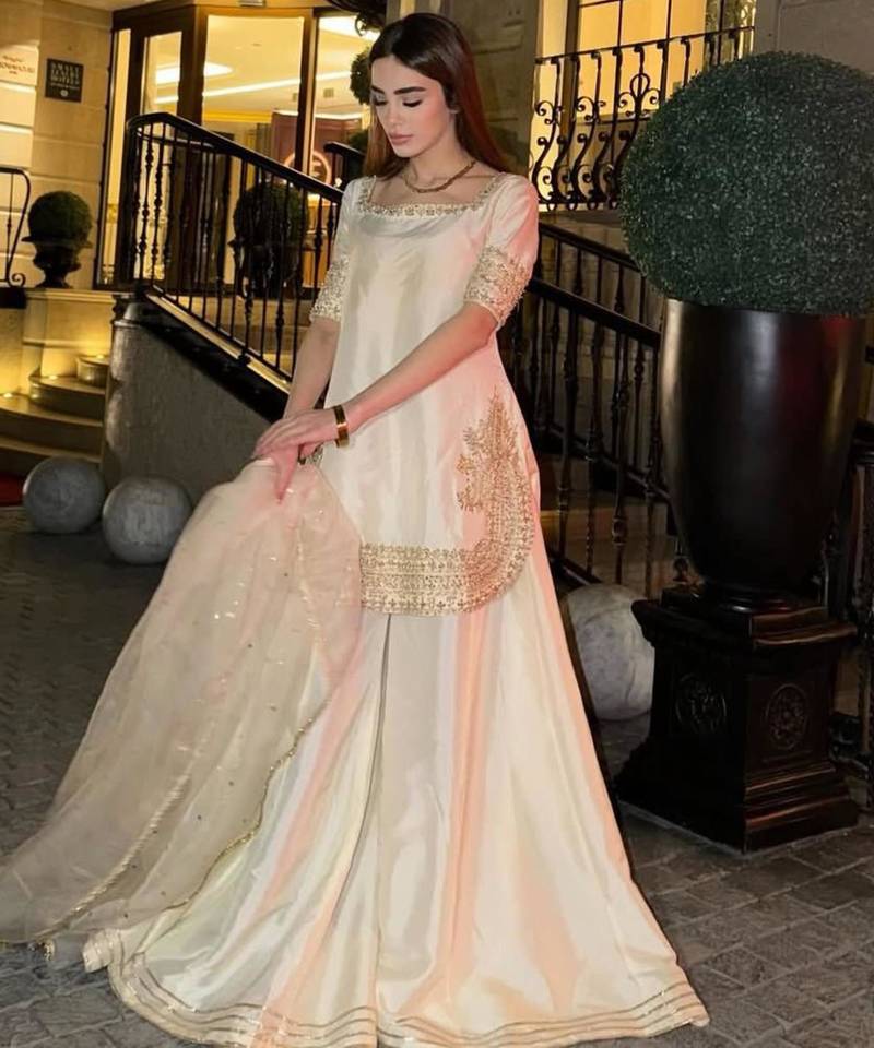 White gold-border sharara suit