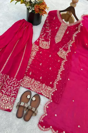 Rani pink heavily embroidered silk blend sharara set