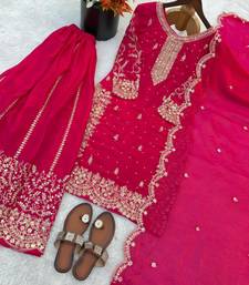 Rani pink heavily embroidered silk blend sharara set