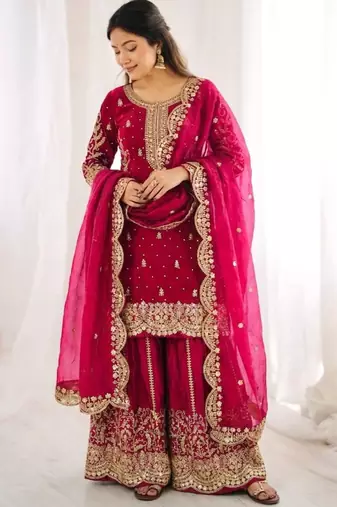 Rani pink heavily embroidered silk blend sharara set