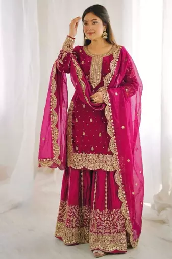 Rani pink heavily embroidered silk blend sharara set