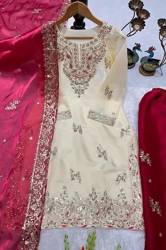 Cream kameez with rani pink palazzo embroidered suit