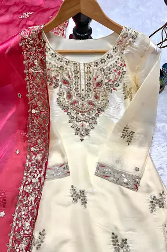 Cream kameez with rani pink palazzo embroidered suit