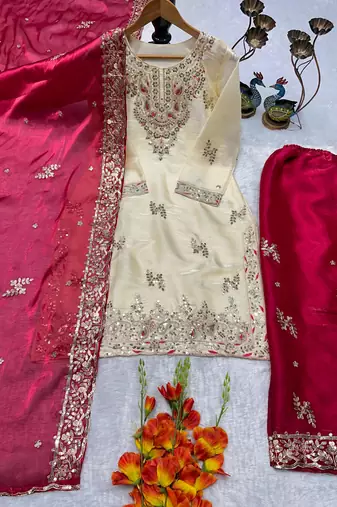 Cream kameez with rani pink palazzo embroidered suit