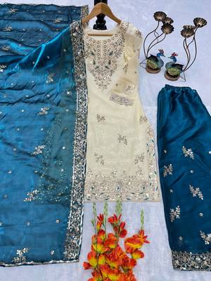 Cream and teal embroidered suit 4