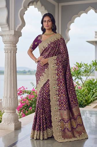 Plum Color Embroidered Lace,Dori,Multi Thread And Zari With Sequins And Zircon Diamond Work Banarasi Silk Saree