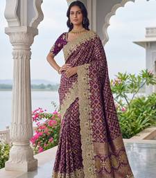 Plum Color Embroidered Lace,Dori,Multi Thread And Zari With Sequins And Zircon Diamond Work Banarasi Silk Saree
