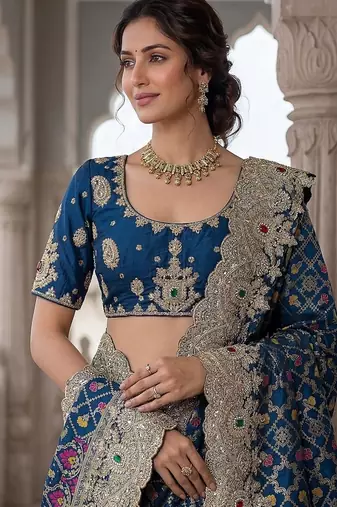 Teal Color Embroidered Lace,Dori,Multi Thread And Zari With Sequins And Zircon Diamond Work Banarasi Silk Saree