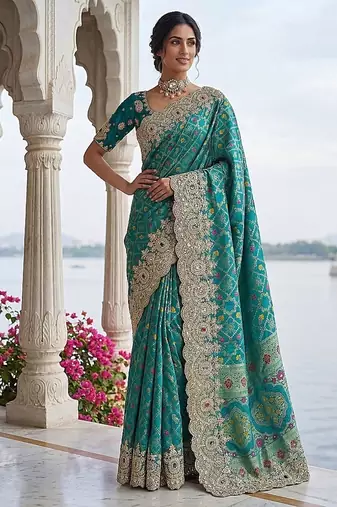 Turquoise Color Embroidered Lace,Dori,Multi Thread And Zari With Sequins And Zircon Diamond Work Banarasi Silk Saree