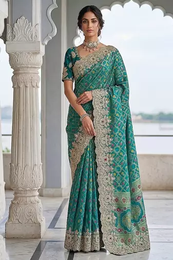 Turquoise Color Embroidered Lace,Dori,Multi Thread And Zari With Sequins And Zircon Diamond Work Banarasi Silk Saree