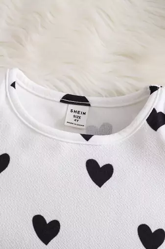 Black & white heart printed polyester pu leather fit & flare dress for girls