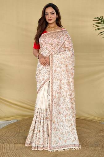 Cream loom tussar saree with all over designer embroidery