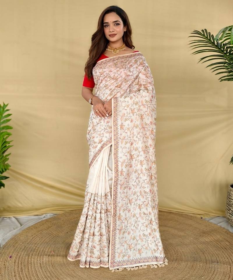 Cream loom tussar saree with all over designer embroidery