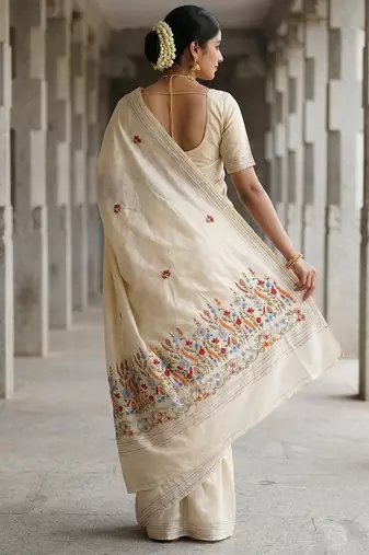 Cream loom tussar saree with all over designer embroidery