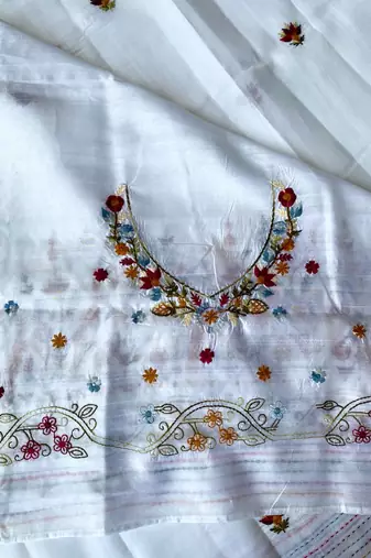 White loom tussar saree with all over designer embroidery