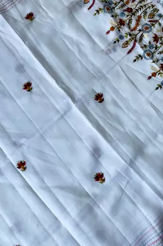White loom tussar saree with all over designer embroidery