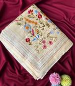 Cream loom tussar saree with all over designer embroidery