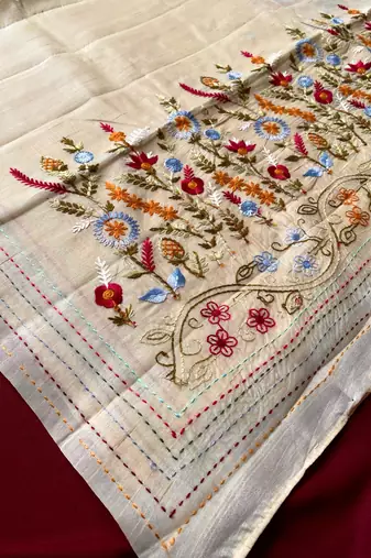 Cream loom tussar saree with all over designer embroidery